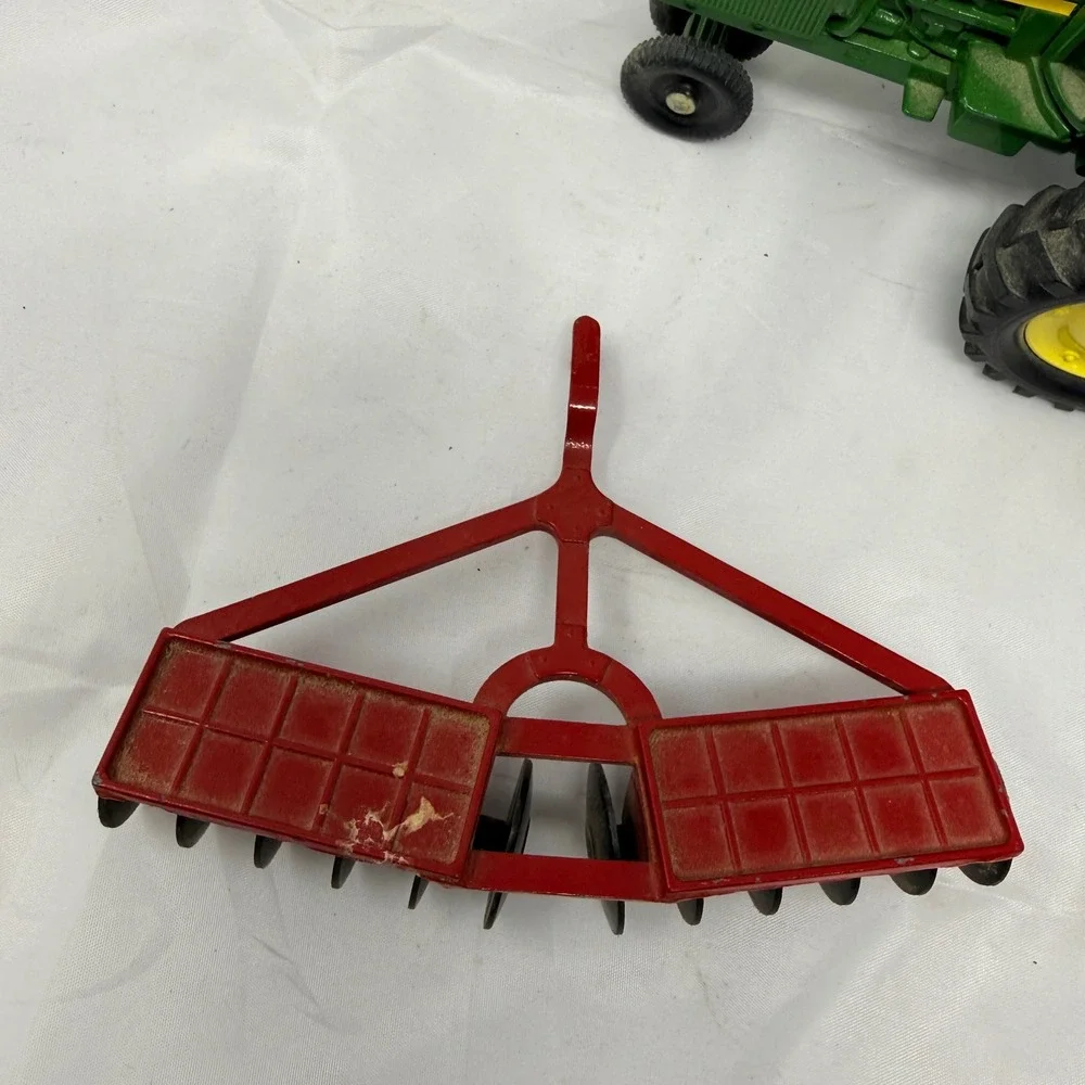 John Deere Diecast Metal Tractor with Red Disc Harrow Attachment Vintage Toy